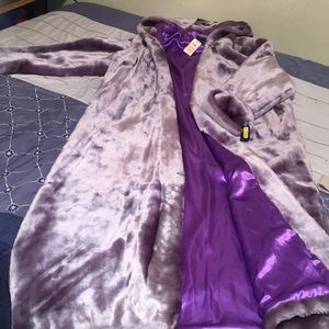 Royal purple coat with fur on the outside.